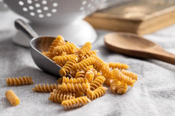 Uncooked Whole Grain Pasta Raw Penne Pasta Scoop — Stock Photo, Image