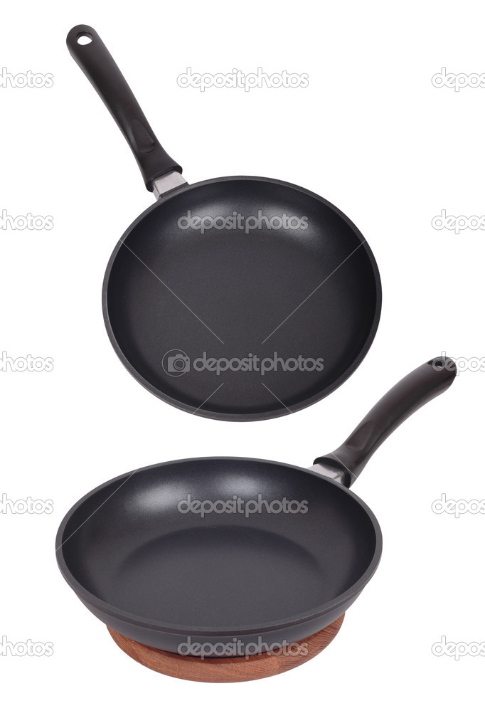 Set of empty frying pans