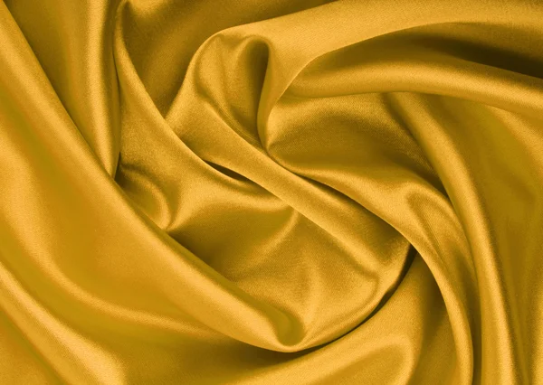 Золотой текстиль — стоковое фото