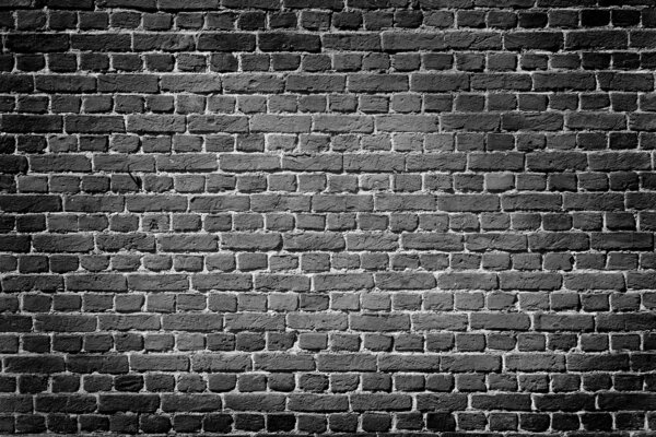Old dark brick wall