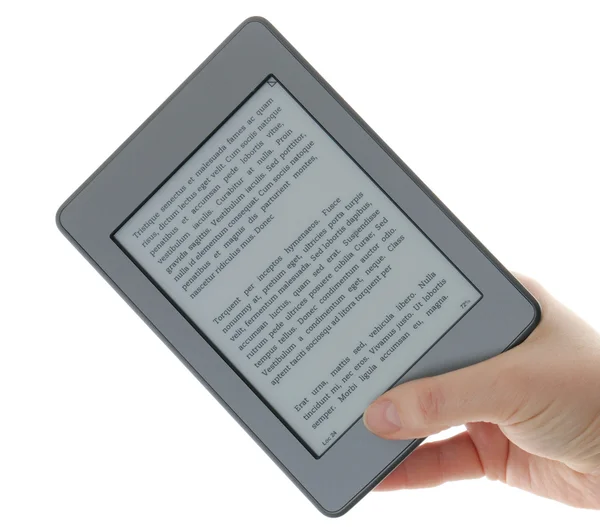 Segurando leitor de E-book nas mãos — Fotografia de Stock