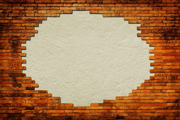 Fundo de papel grungy cercado por quadro de tijolo — Fotografia de Stock