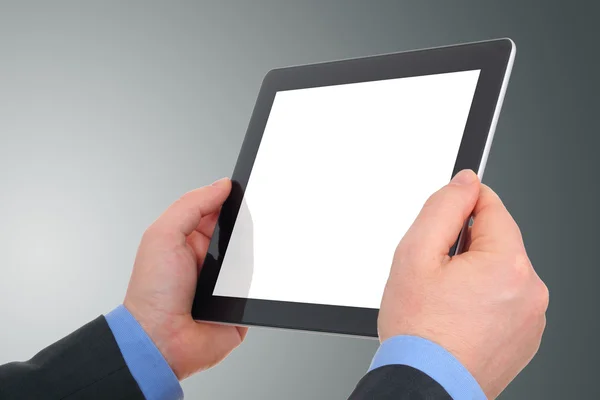 Zakenman handen houden de touchscreen toestel. — Stockfoto