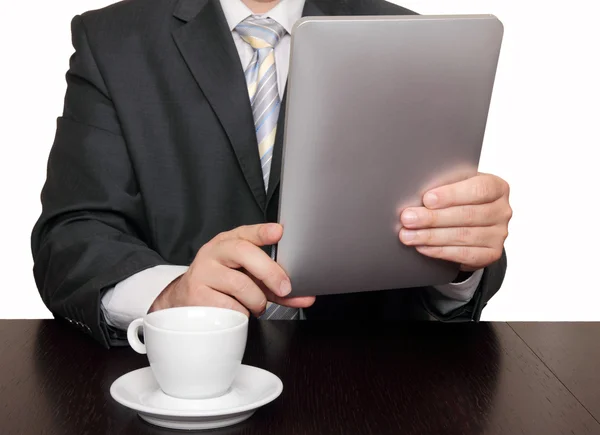 Man holding digital tablet and and drinking coffee — Stock Photo, Image