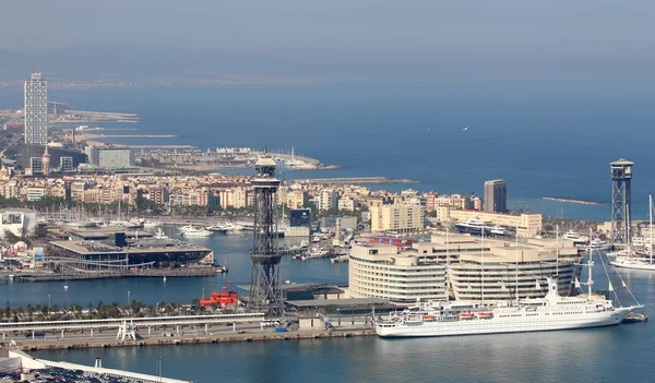 Barcelona and port Port Vell, view from natural park Montjuic, May 03, 2013 in Barcelona, Spain — Stock Photo, Image