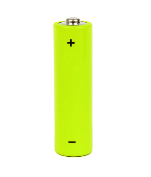 Bateria pequena verde claro com sinais positivos e negativos — Fotografia de Stock