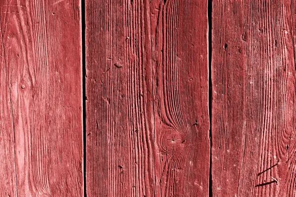 Textura de madeira vermelha com padrões naturais — Fotografia de Stock