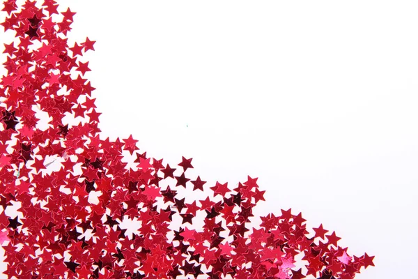 Red stars in the form of confetti — Stock Photo, Image