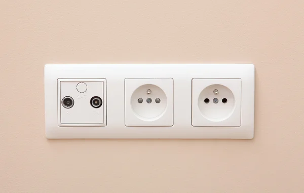 White electric socket on the wall. — Stock Photo, Image