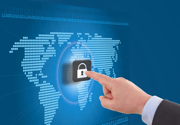 Businessman selecting a padlock with world map on the background — Stock Photo, Image
