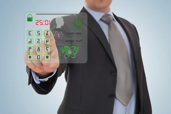 Businessman pressing the security code — Stock Photo, Image