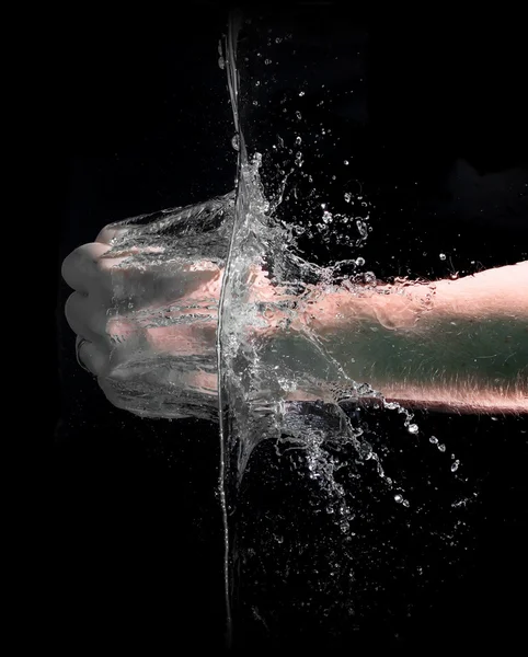 Fist punch into water — Stock Photo, Image