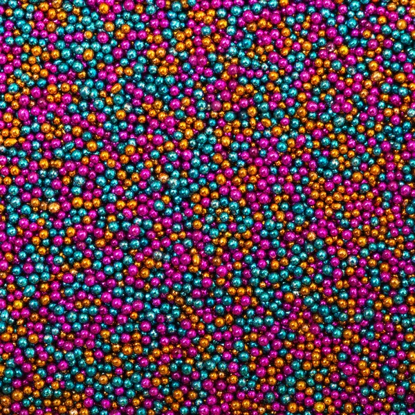 Background from Turquoise, Pink and Golden Balls of Bead