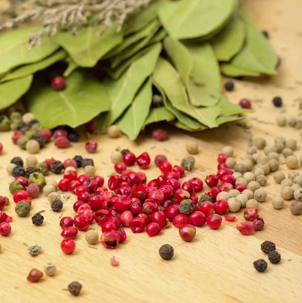 Dry bay laurel leaf with multicolored peppercorn