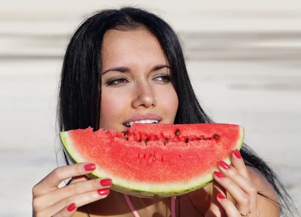 Girl eats a water-melon — Stock Photo, Image