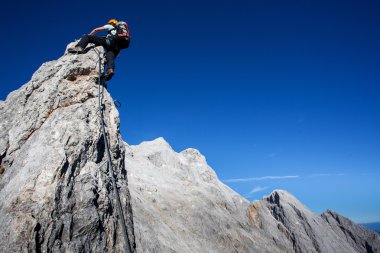 Alpine climbing clipart