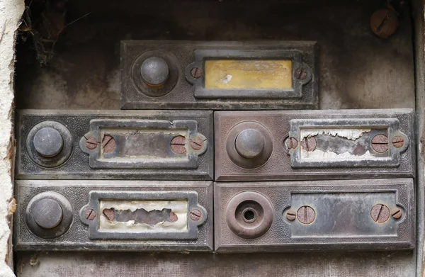 Old and damaged doorbells - buttom — Stock Photo, Image