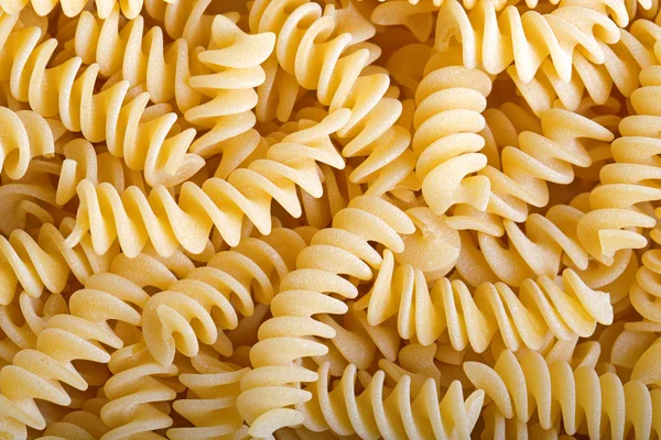 Pasta spiraal achtergrond — Stockfoto