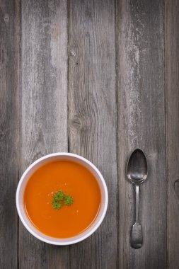 Soup on wood table clipart