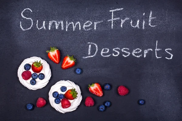 Summer fruit desserts on chalkboard — Stock Photo, Image