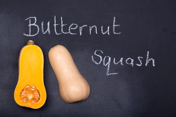 Butternut squash on chalkboard — Stock Photo, Image