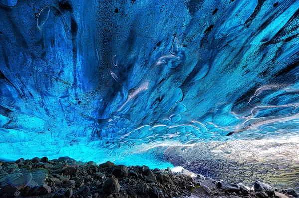 Detail of the blue glacial ice in an ice cave in Breioarmerkurjokull, part of the Vatnajokull glacier in southeast Iceland and the largest glacier in Iceland.