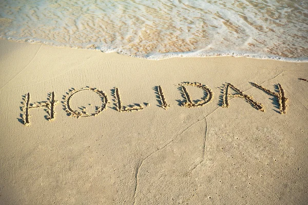 Señal de vacaciones en la playa — Foto de Stock