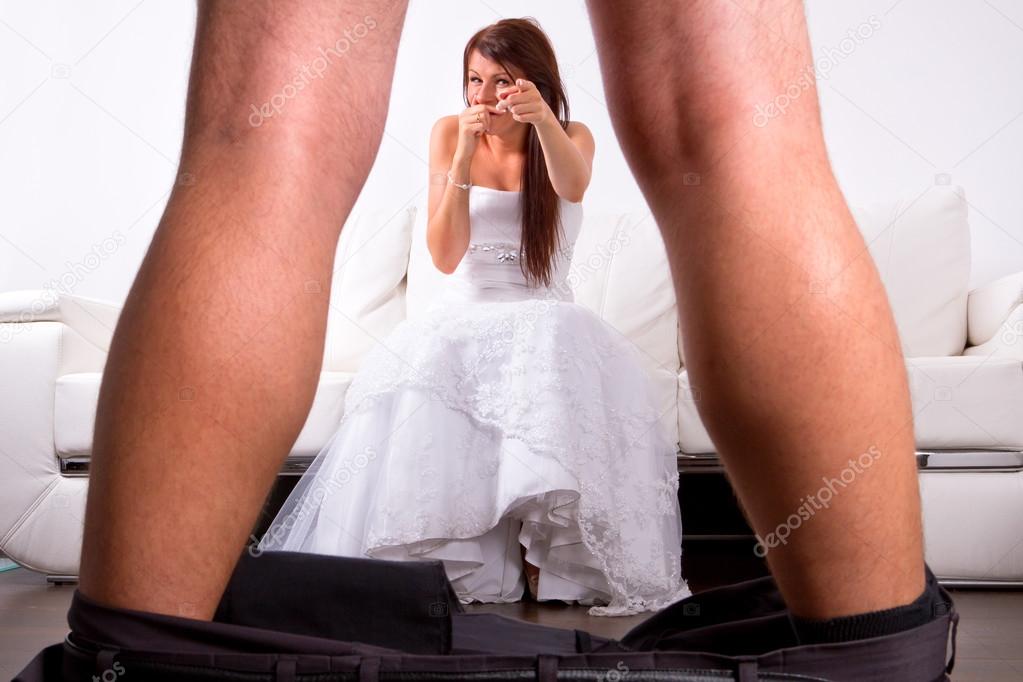 Bride laughing at the groom striptease