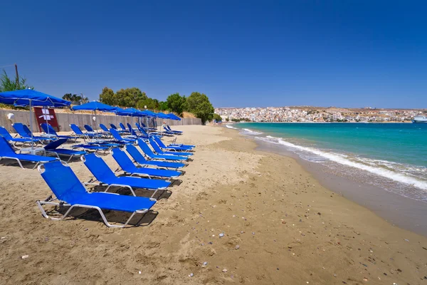 Blue deck chairs on the public beach of Crete — Stock Photo, Image