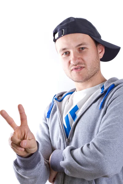 Portrait of young man in sport hat — Stock Photo, Image