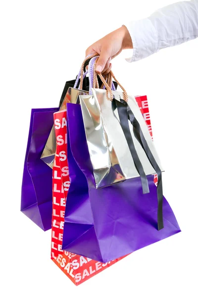 Hand holding shopping bags — Stock Photo, Image