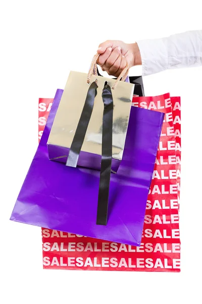 Hand holding shopping bags — Stock Photo, Image