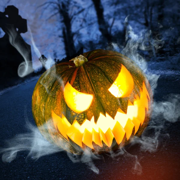 Scary halloween pumpkin in the dark forest — Stock Photo, Image
