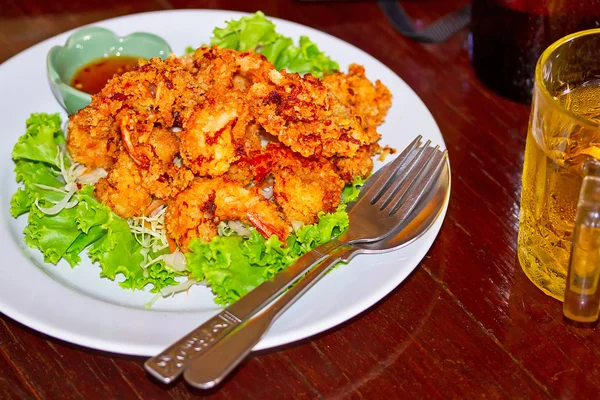 Deep fried squid rings on the plate — Stock Photo, Image