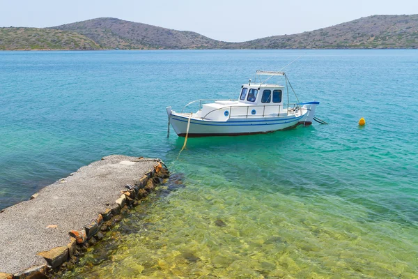 Small fishing boat at the coast of Crete — Stock Photo, Image