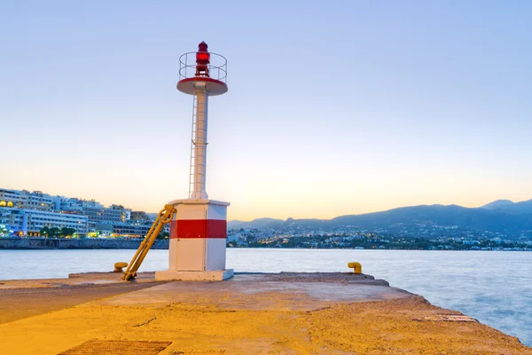 Lighthouse of Agios Nikolaos city at sunset on Crete — Stock Photo, Image