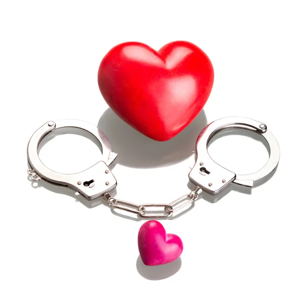 Форми серця в наручниках — стокове фото