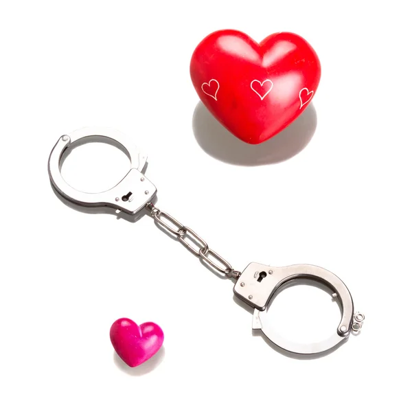 Heart shapes in handcuffs — Stock Photo, Image