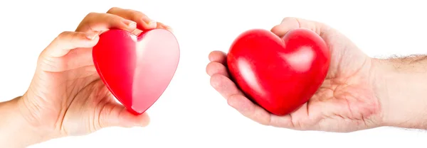 Hands of a couple with heart shapes — Stock Photo, Image