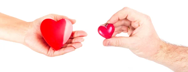 Hands of a couple with heart shapes — Stock Photo, Image