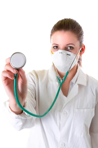 Female doctor in mask with pointed stethoscope — Stock Photo, Image