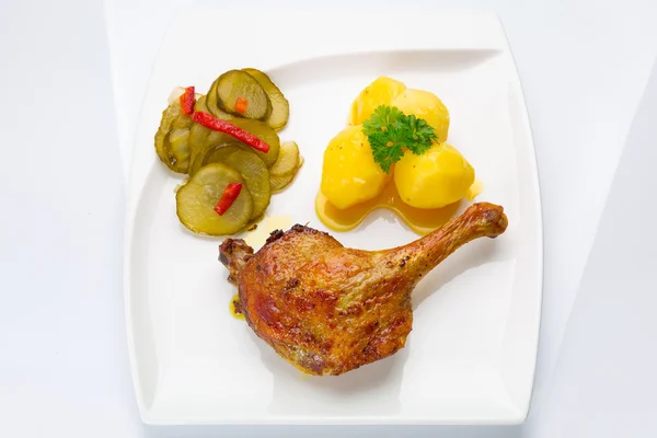 Roast duck leg with potatoes — Stock Photo, Image