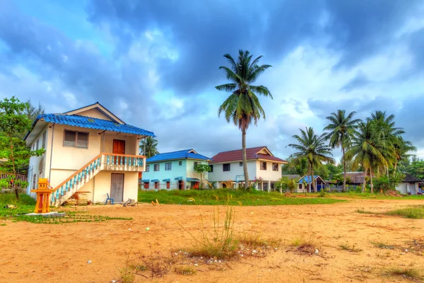 Holiday houses on poles in Thailand — Stock Photo, Image