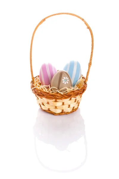 Colorful Easter eggs in the basket — Stock Photo, Image