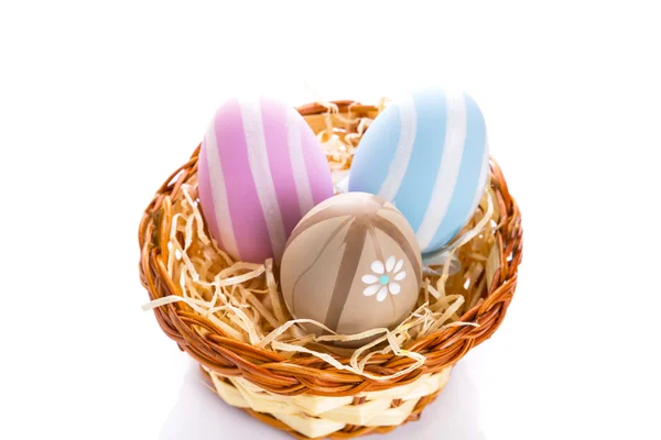 Colorful Easter eggs in the basket — Stock Photo, Image