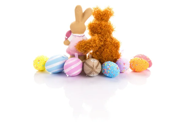 Easter eggs and bunnies in hug — Stock Photo, Image