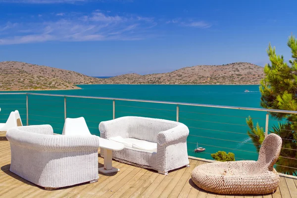 White sofas with Mirabello Bay view — Stock Photo, Image
