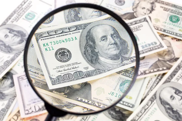 Dollar under magnifying glass — Stock Photo, Image