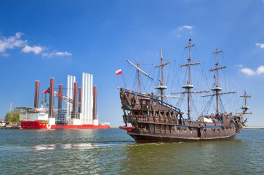 Pirate galleon ship on the water of Baltic Sea clipart