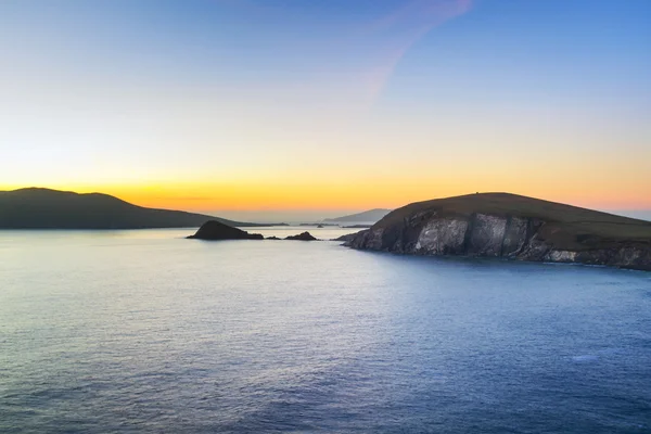 Dunquin, z którego zatoki w co. kerry na zachodzie słońca — Zdjęcie stockowe